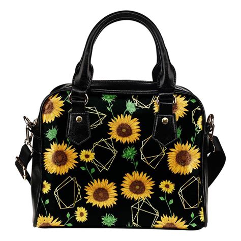 coach purse with sunflowers.